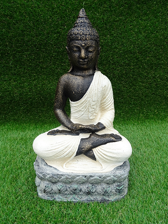 Bouddha blanc assis en lotus
