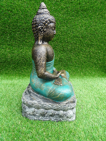 Bouddha vert assis en lotus