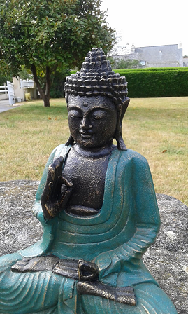 Statuette verte Bouddha enseignement