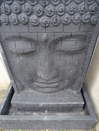 Mur d'eau visage bouddha